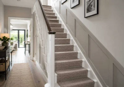 Modern Staircase with a Herringbone Patterned Carpet