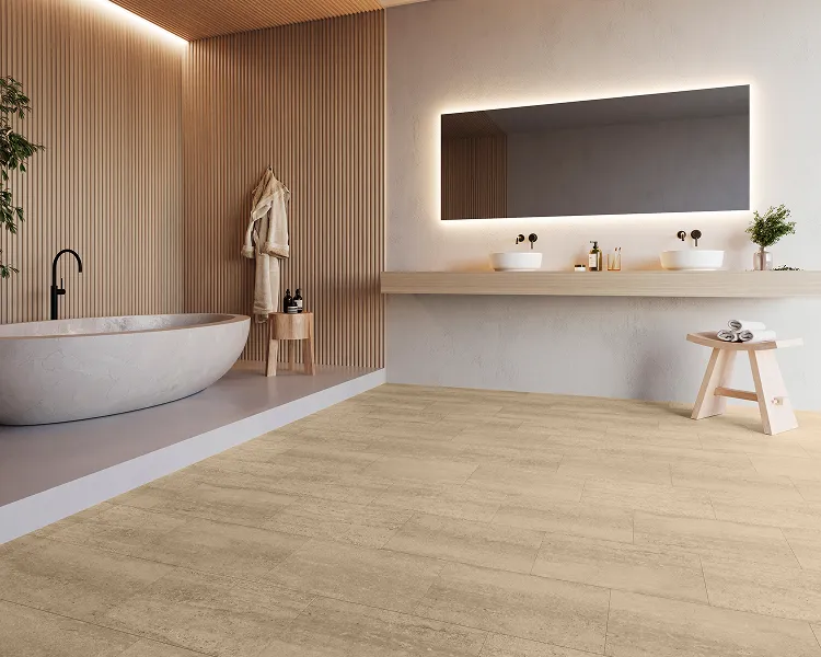 Modern bathroom with freestanding oval tub, wooden slat wall, robe, and double vanity with backlit mirror, two sinks, plant, and a stool.