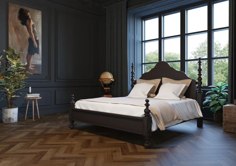 Dark-paneled bedroom with a carved four-poster bed, beige bedding and striped throw, large grid windows, globe on a stand, potted plants and parquet floor.